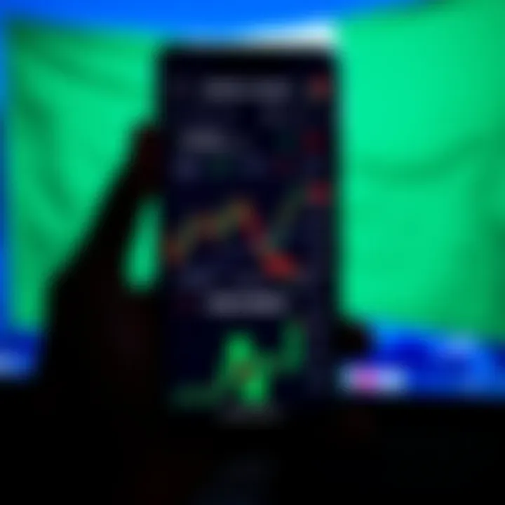 Mobile phone displaying forex trading chart with Nigerian flag background